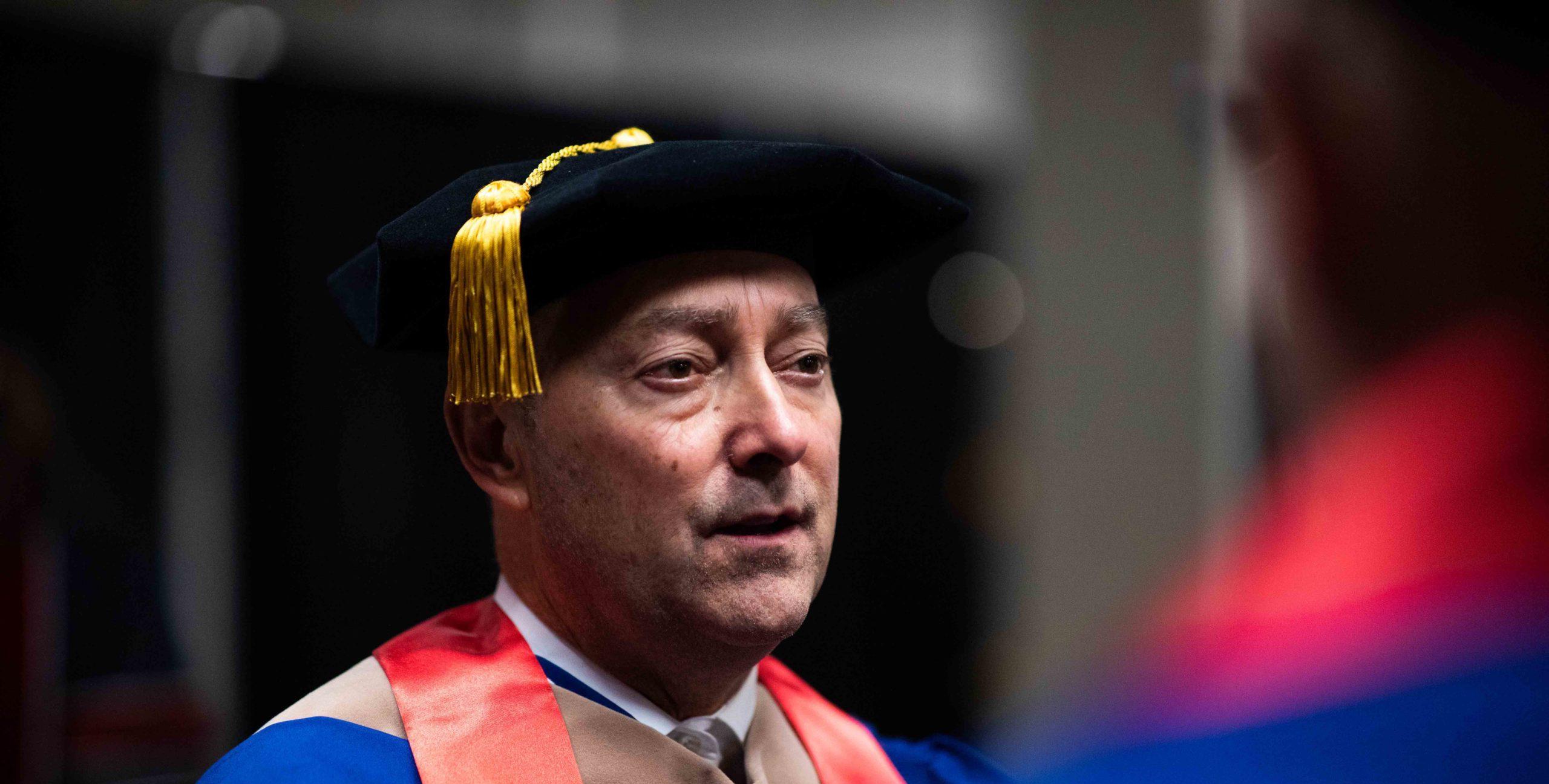 Admiral Stavridis speaking with a group of graduates.