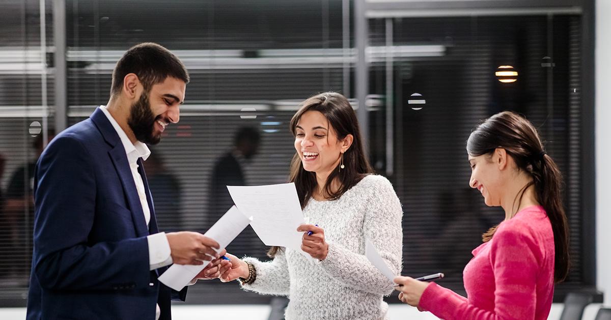 MBA students discussing assignment.