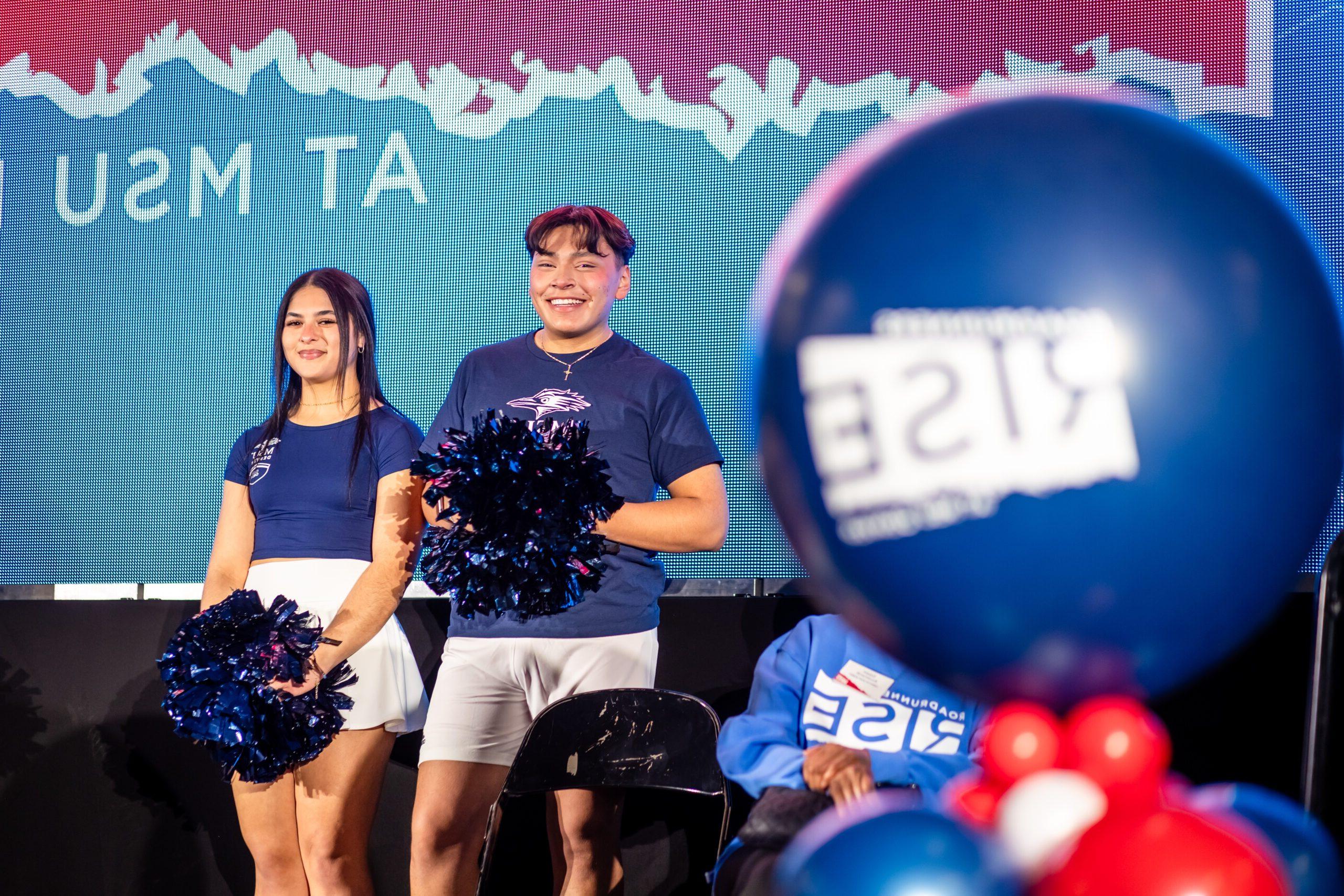 Cheerleaders performing at Roadrunners Rise Campaign Launch event