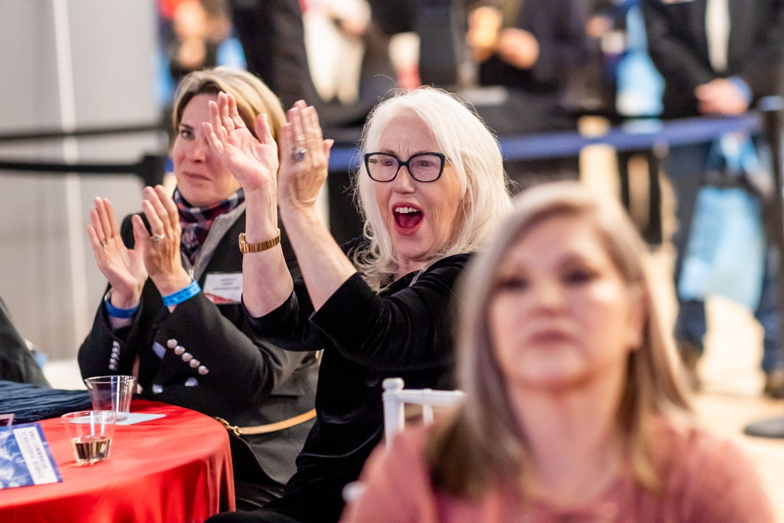 Barb Grogan cheering at Roadrunners Rise Campaign Launch event